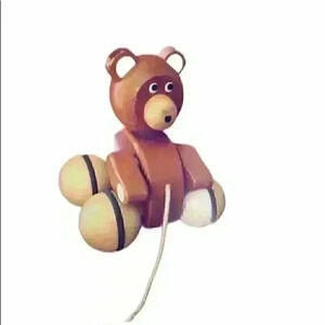 FAO Schwarz brown wooden bear rolling toy baby